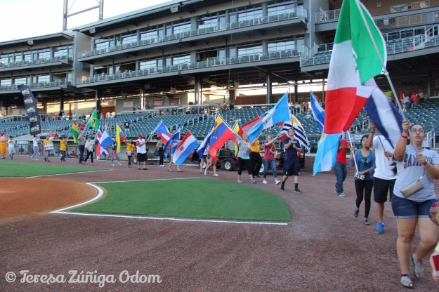 Samford Students participated in the Parade of Latino Country Flags before the beginning of the game.