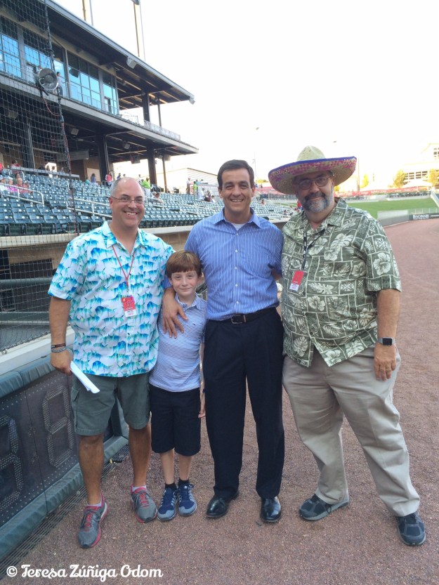 Mike Suco, one of Fiesta's founding board members poses with his son Mikey, and Barons Staff Members John Cook and Don Leo.