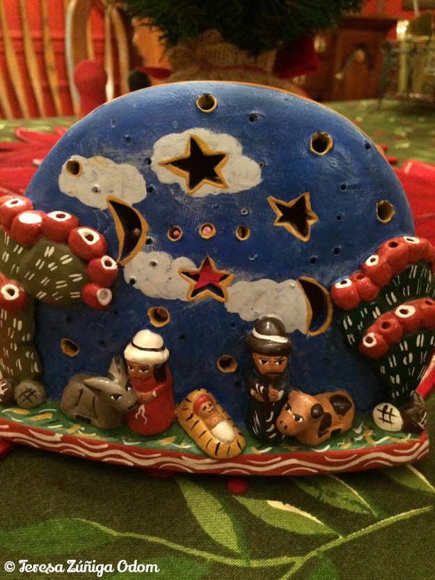 Peruvian nativity that also has a place for a votive candle in the back.
