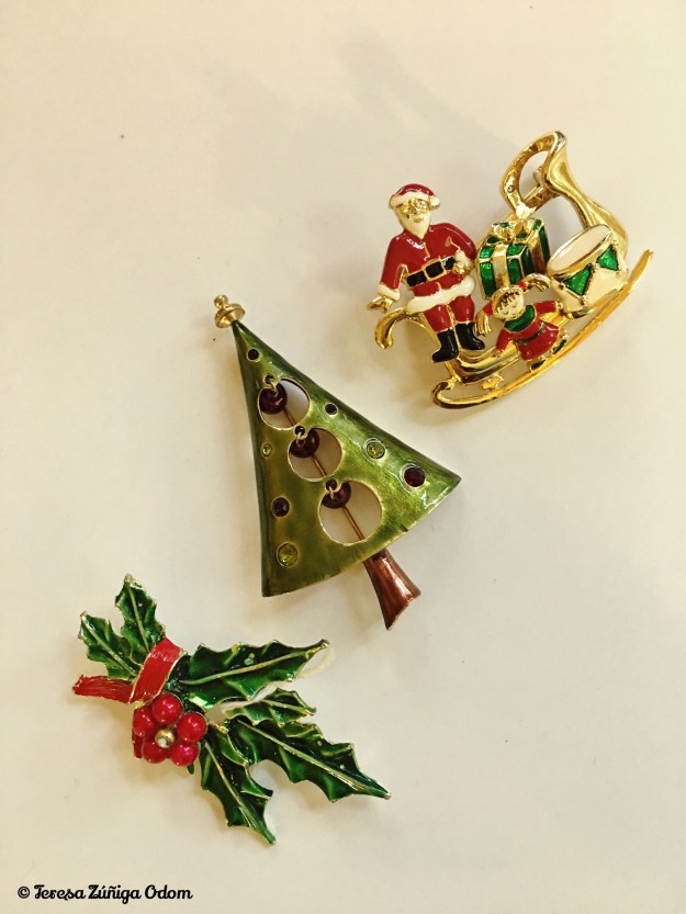 These pins have no marking that I could find. The Santa in the sleigh moves along with the other pieces attached. Pretty unique!